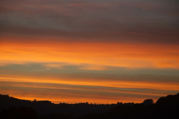 Obraz premium sunset over the field