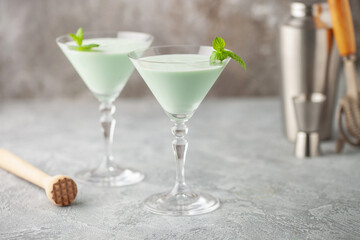 Grasshopper cocktail  from New Orleans, with green mint liqueur, chocolate liqueur and cream in martini glass.