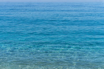 Blue sea water with ripples on the surface