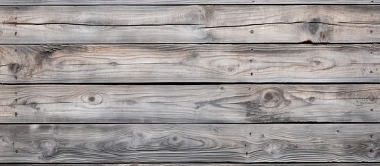Close up of a textured wooden wall background old and grey