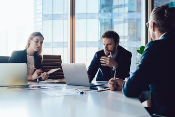 Group of professionals brainstorming and sharing ideas.