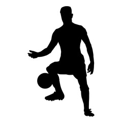 Silhouette of a male soccer player kicking a ball. Silhouette of a football player in action pose.