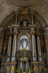 Fototapeta na wymiar Intricate Altar within the Serene Walls of a Catholic Church
