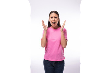 young charismatic slender woman dressed in a pink corporate color t-shirt with print mockup