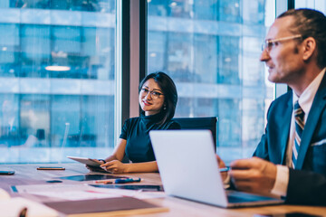 Group of corporate employees brainstorming on financial strategy planning