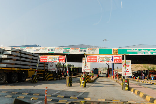Fast-Tag sign near a toll booth 