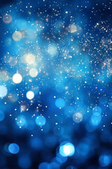 Blue background with sparkles and illuminated bokeh lights.