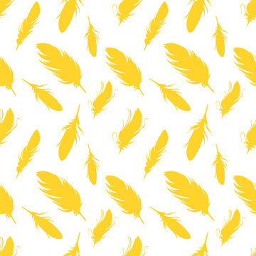 Seamless pattern of bird feathers on a white background. Vector illustration. Design of fabric, paper, packaging. Yellow feathers.