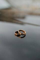 wedding rings on the table