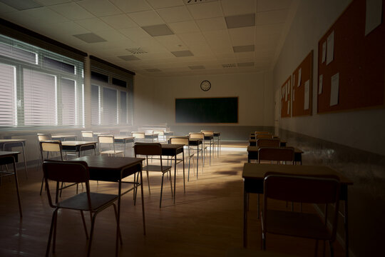 Rays of light falling to the empty classroom. Abandoned school. Disturbing mood
