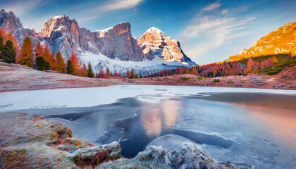 wonderful morning view of frozen limides lake spectacular autumn landscape of dolomite alps superb outdoor scene of falzarego pass italy europe beauty of nature concept background - obrazy, fototapety, plakaty