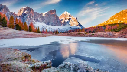 Schilderijen op glas wonderful morning view of frozen limides lake spectacular autumn landscape of dolomite alps superb outdoor scene of falzarego pass italy europe beauty of nature concept background © Charlotte