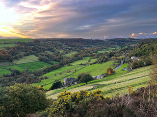 Autumn sunset over Shibden Valley, with a panoramic view of, trees, farms, and fields in, Shibden Halifax
