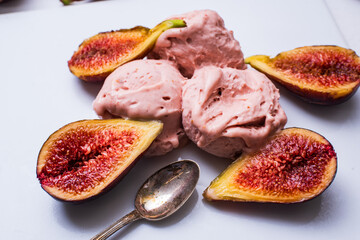 plate with fig ice cream and fresh figs cut in half