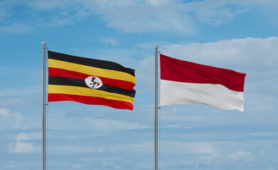 Indonesia and Uganda flags, country relationship concept
