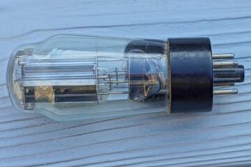 one whole glass retro electric historical vacuum radio tube with metal contacts for an old retro TV...