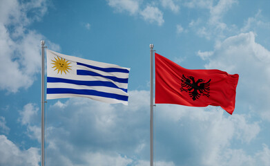 Uruguay and Albania national flags, country relationship concept
