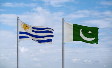 Pakistan and Uruguay flags, country relationship concept