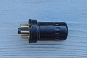 one whole iron black  retro electric historical vacuum radio tube with metal contacts for an old...