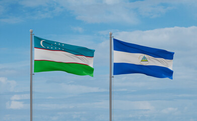 Nicaragua and Uzbekistan flags, country relationship concept