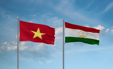 Tajikistan and Vietnam flags, country relationship concept