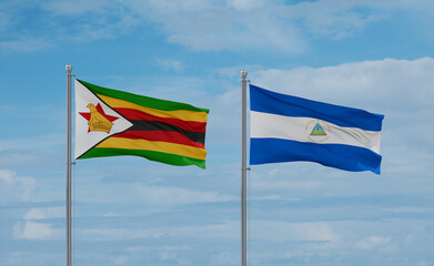 Nicaragua and Zimbabwe flags, country relationship concept