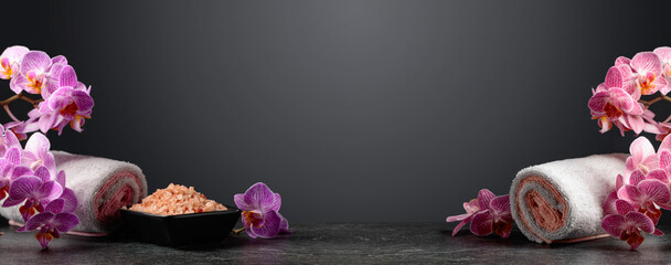 Beautiful blooming orchids and pink sea salt.