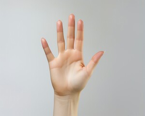 person's hand with a band around it