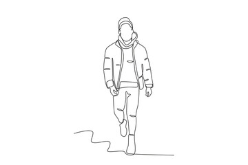 A man walking in winter clothes. Winter outfit one-line drawing