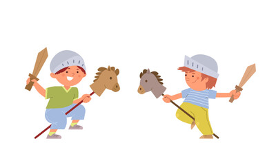 Two kids boys rides toy horses playing knights and fighting with wooden swords. Childrens games concept