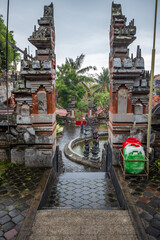 A Buddhist temple in the evening in the rain. The Brahmavihara-Arama temple has beautiful gardens...