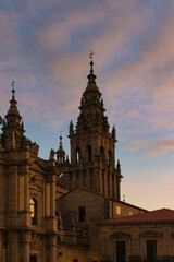 Fototapeta na wymiar Close-up of the Cathedral of Santiago de Compostela, with its impressive architectural details illuminated by the warm evening light