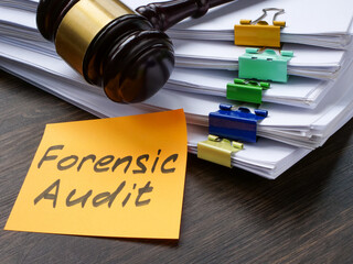 Lots of paper and forensic audit notes. - obrazy, fototapety, plakaty