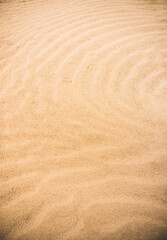 Sand texture in the desert of Uzbekistan, part of a sand dune in the steppes for a background minimalism