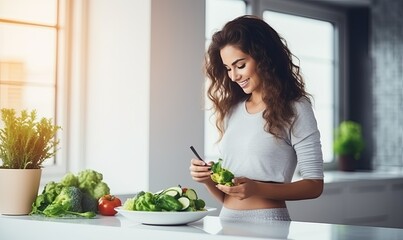 Obraz na płótnie Canvas Woman in Kitchen Captivated by Smartphone