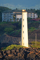 Seen from the Pacific Ocean, Ninini Point Lighthouse is 86 feet high and is located on Ninini...