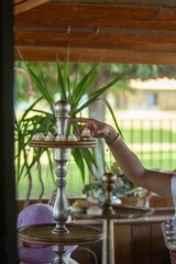 a hand taking an appetizer