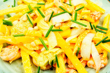 Grilled shrimps, avocado, mango salad. Food background