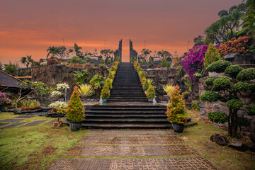 A Buddhist temple in the evening in the rain. The Brahmavihara-Arama temple has beautiful gardens...