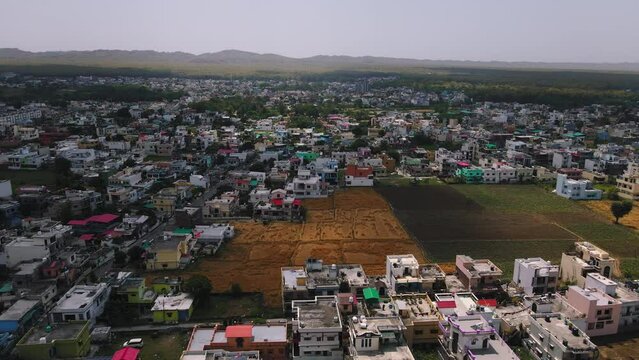 Aerial view of Dehradun city, Uttarakhand, India. Drone shot of the beautiful Indian City. Fast-growing Indian Cityscape.