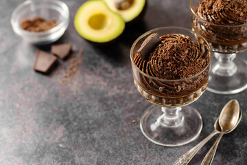 Avocado chocolate mousse pudding, keto vegan healthy dessert.