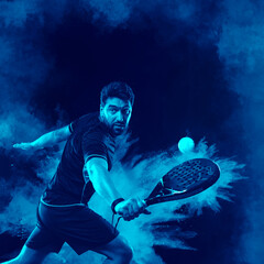 Padel Tennis Player with Racket in Hand. Paddle tenis, on a blue background. Download in high...
