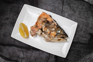 Salmon head Steak grilled whit salt.