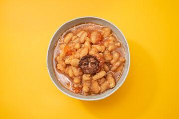 typical portuguese dish dobrada with beans in ceramic bowl