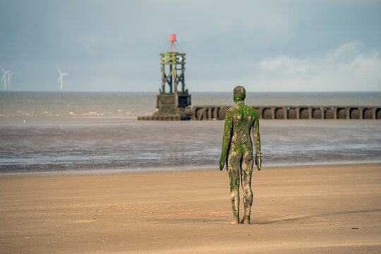 ANOTHER PLACE statue on Crosby Beach, Liverpool