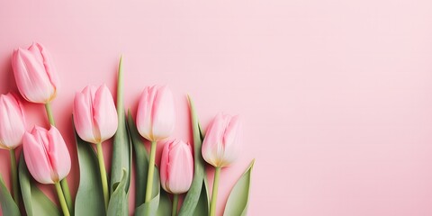 Beautiful composition spring flowers. Bouquet of pink tulips flowers on pastel pink background. Valentine's Day, Easter, Birthday, Happy Women's Day, Mother's Day. Flat lay, top view, copy space.
