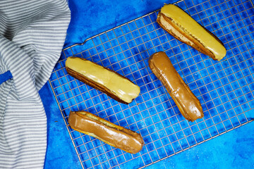 homemade delicious french chocolate and caramel eclair pastry 