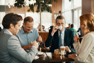 Business people having a meeting in a cafe