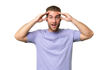 Fototapeta premium Young handsome caucasian man isolated on green chroma background with surprise expression