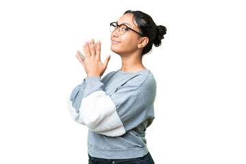 Young Uruguayan woman over isolated chroma key background scheming something